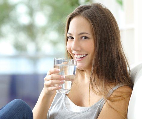 Woman Drinking Water — Terre Haute, IN — Rankin EcoWater