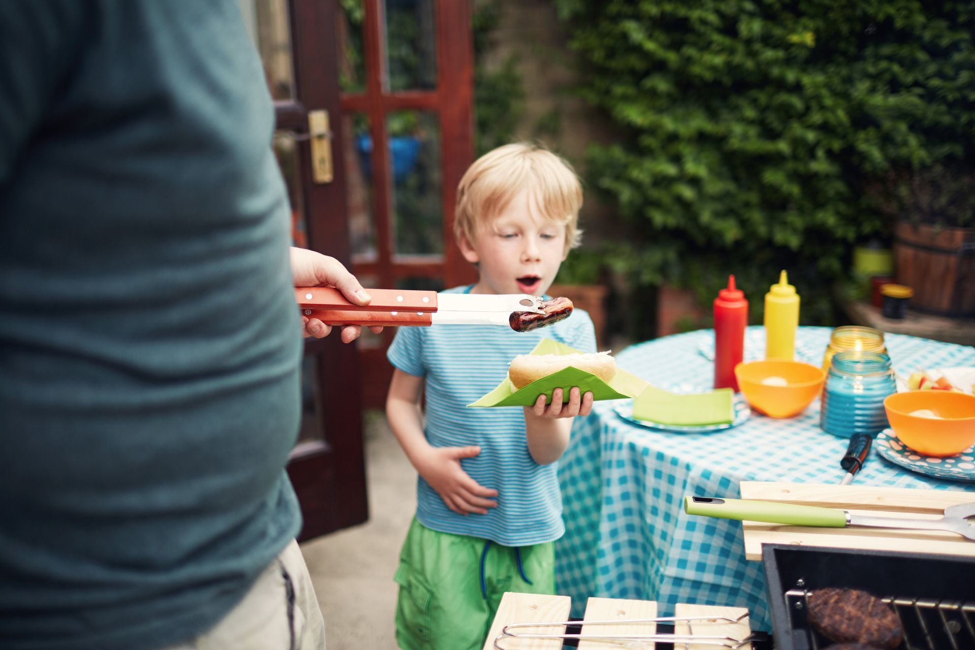 A group of children are jumping in a bouncy house.