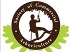 The logo for the society of commercial arboriculture shows a man climbing a tree.