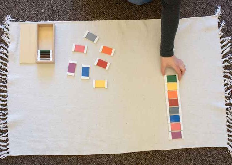 Child working with a Montessori materials
