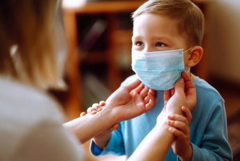 Child wearing a face mask