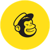 Black monkey face in a cap, smiling and winking on a yellow circle.