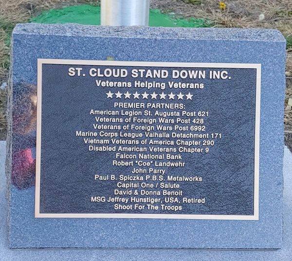 A plaque for st. cloud stand down inc. veterans helping veterans