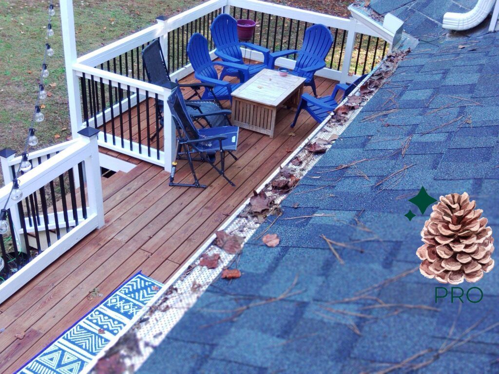 An aerial view of a deck with chairs and a table