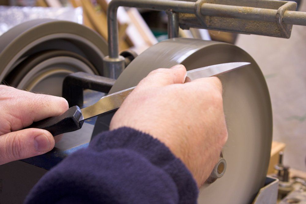 Sharpening A  Knife — Newark, DE — J & A Grinding Inc.