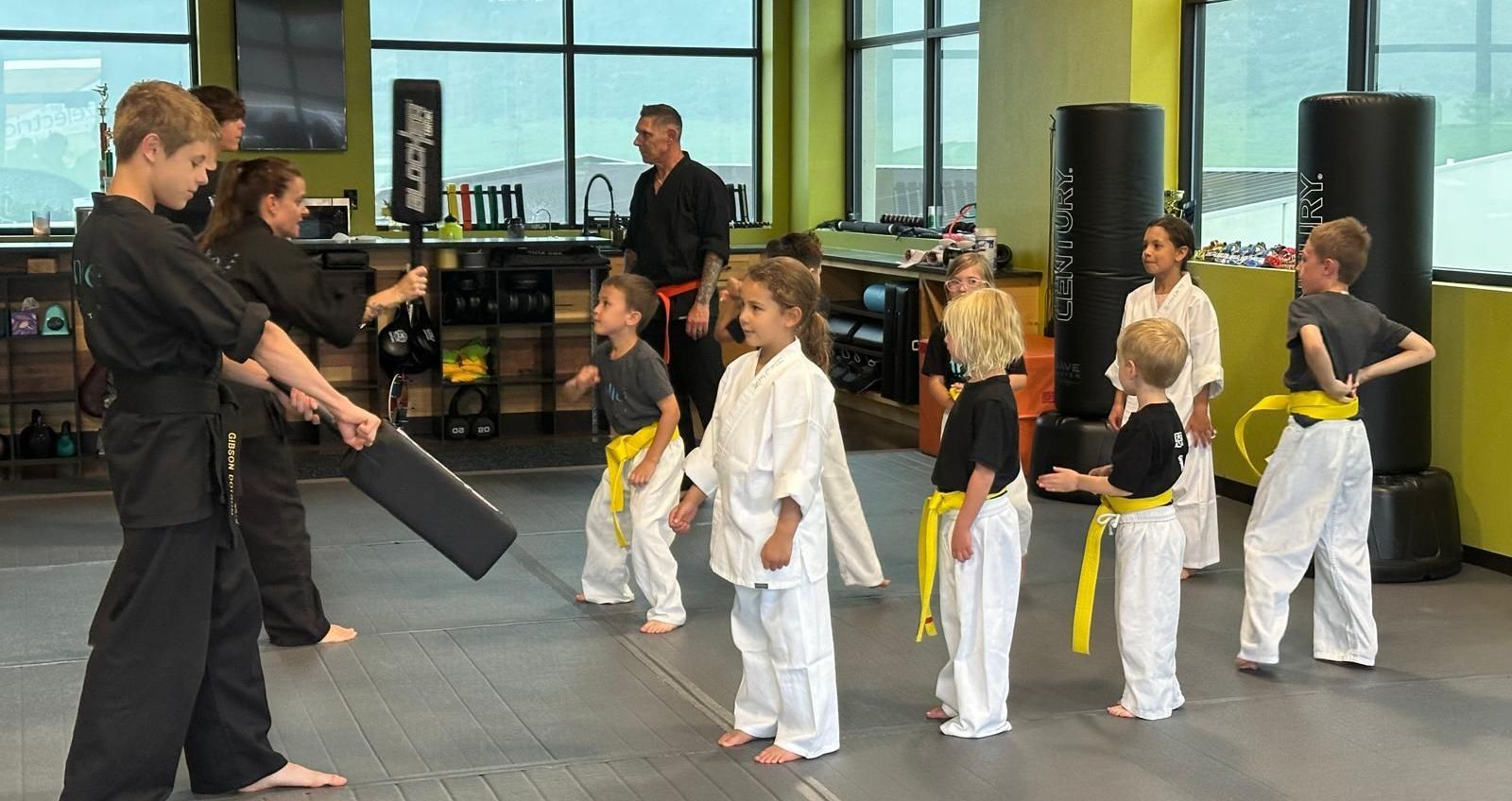 A blurry picture of a bunch of colorful lights on a dark background.