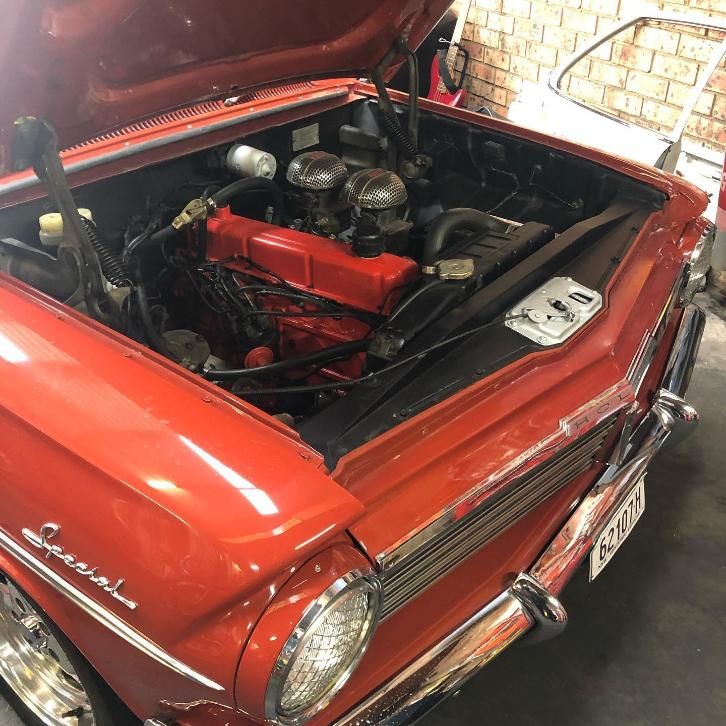 A Red Car With the Hood Open — Coastal Automotive Services Long Jetty in Killarney Vale, NSW