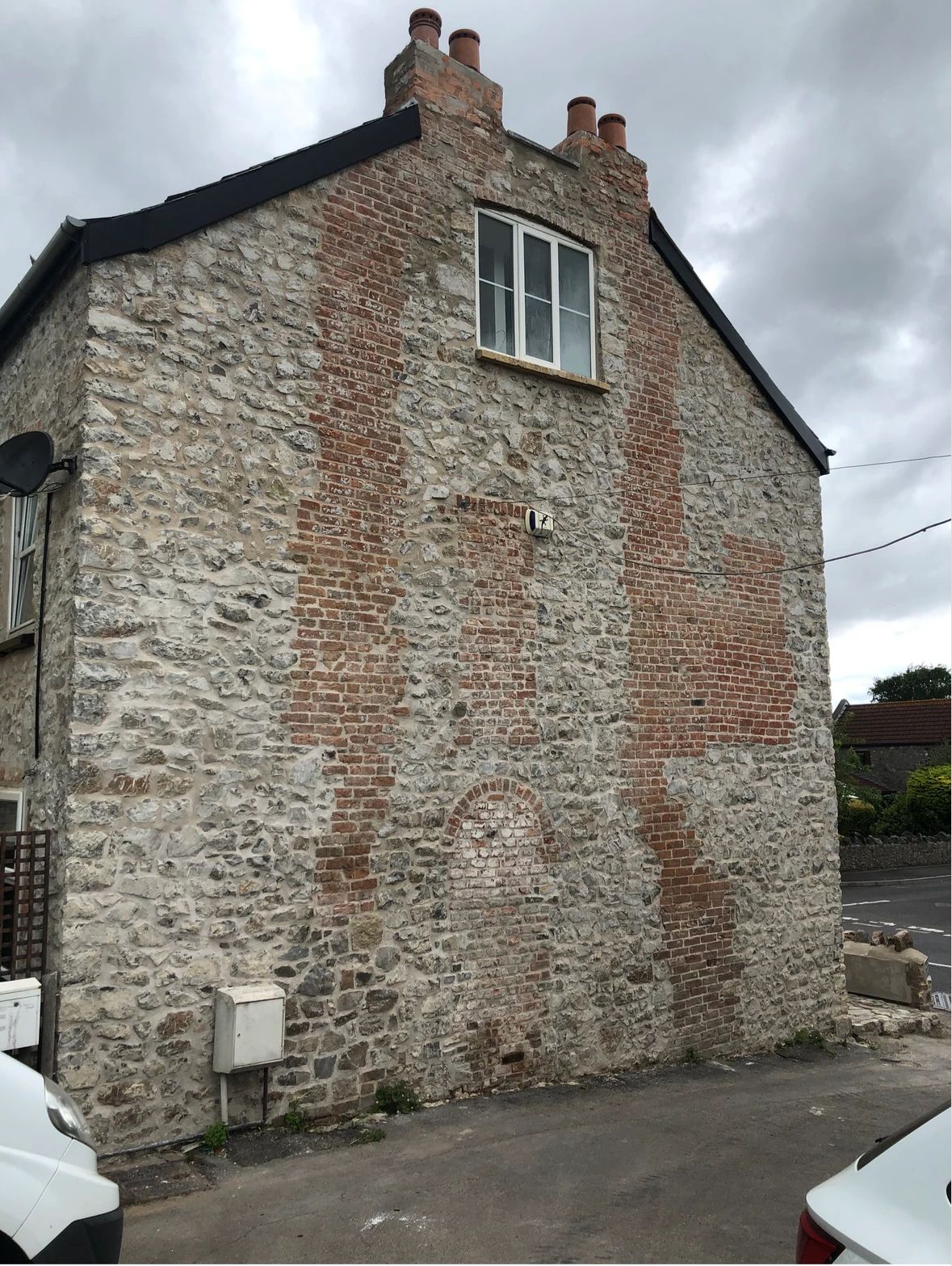 A stone building with the number 10 on it
