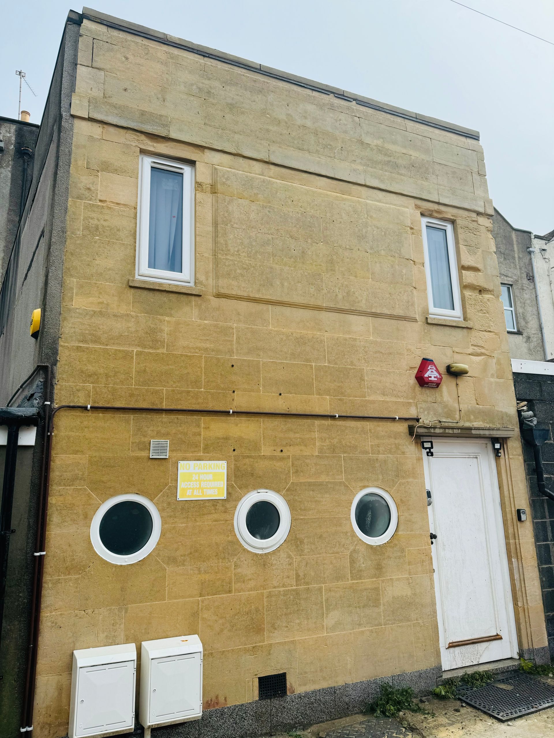 A building with a lot of windows on the side of it