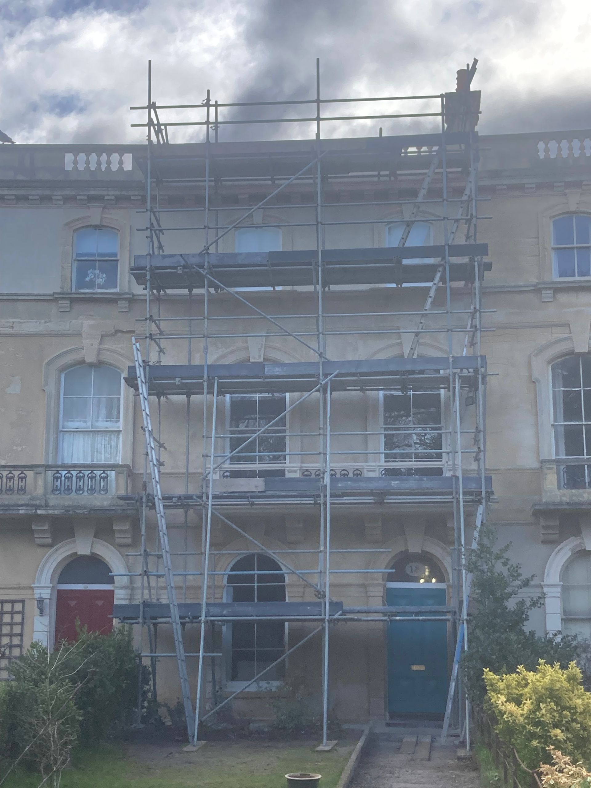 A large building with scaffolding in front of it