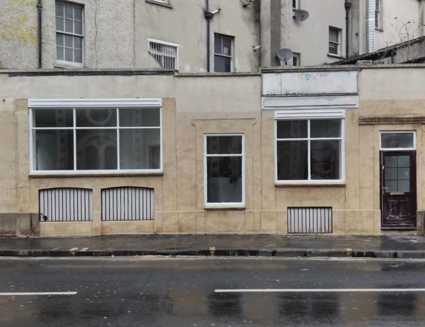 A building with a lot of windows and a door