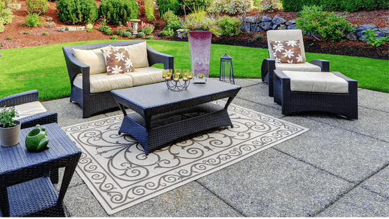 an exposed aggregate concrete patio