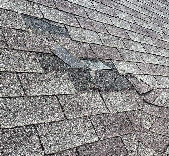 damaged shingles pewaukee