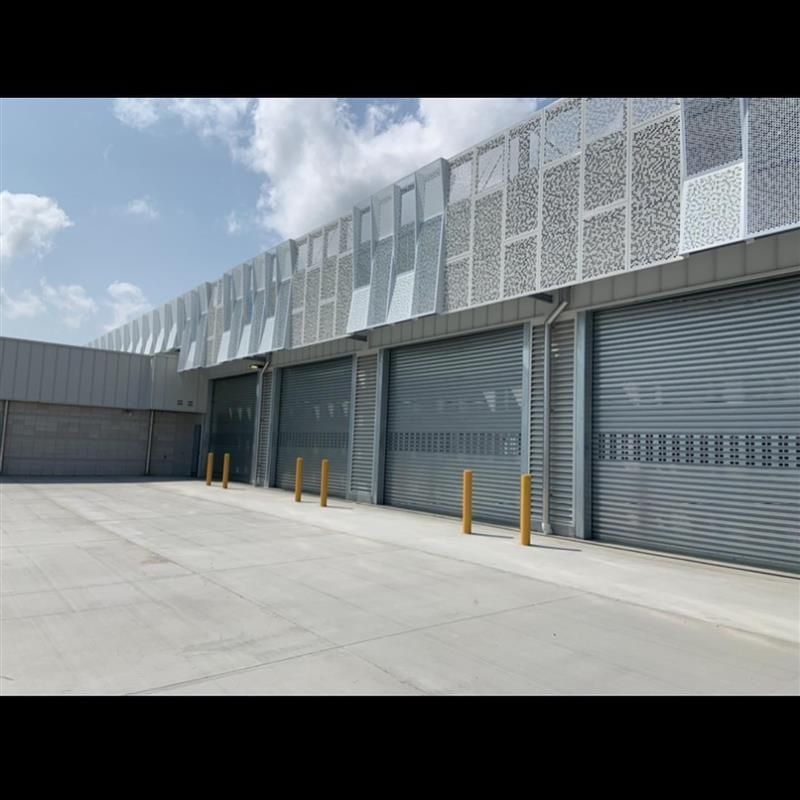 A building with a lot of garage doors on it