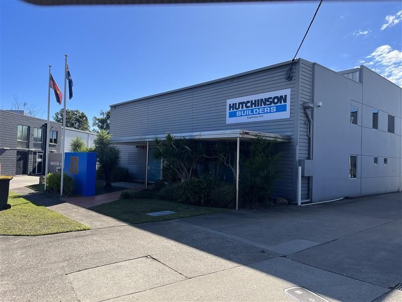 A large building with a sign that says hutchinson on it