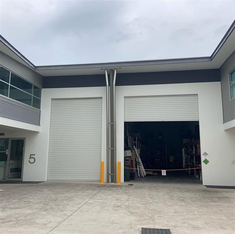 A large white building with the number 5 on it