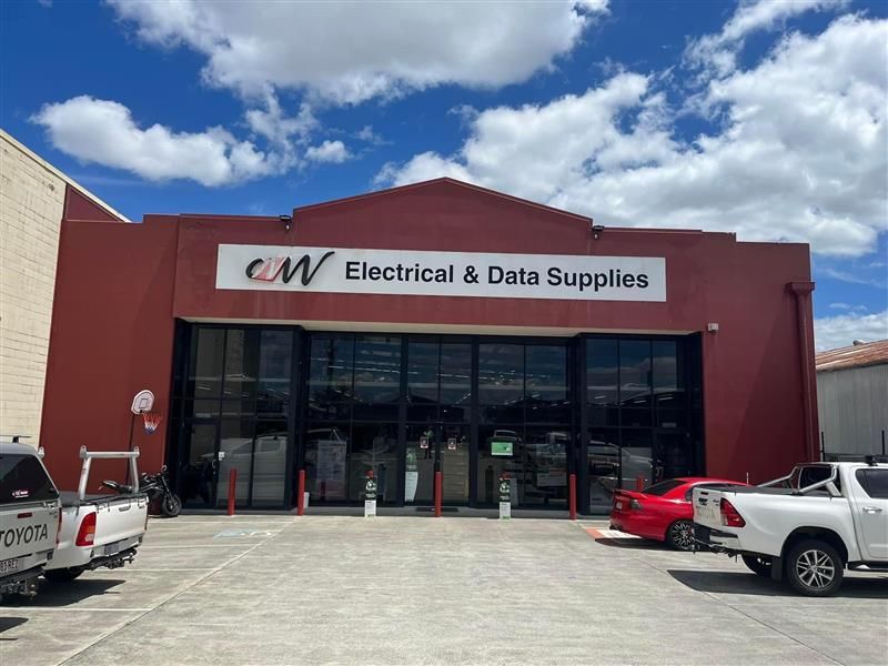 A building with a sign that says electrical and data supplies on it.