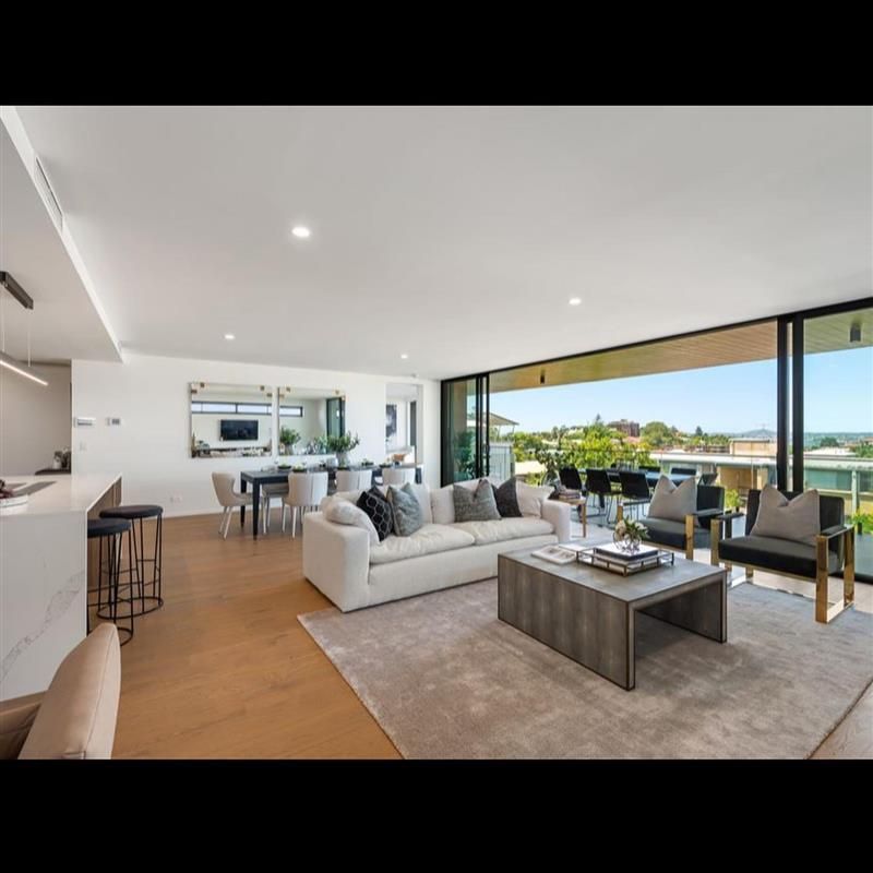 A living room with a couch and a coffee table