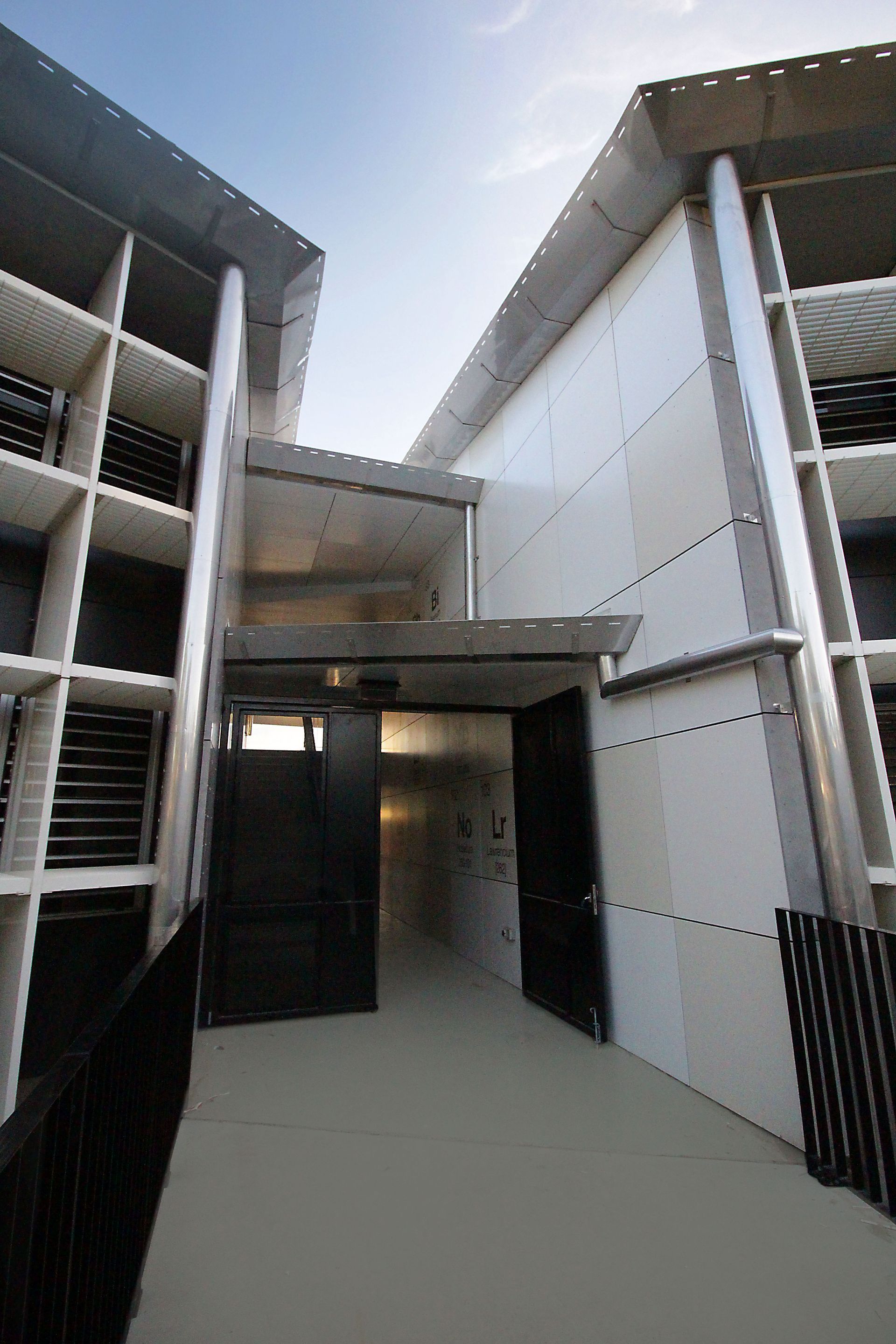 A building with a staircase leading up to a doorway