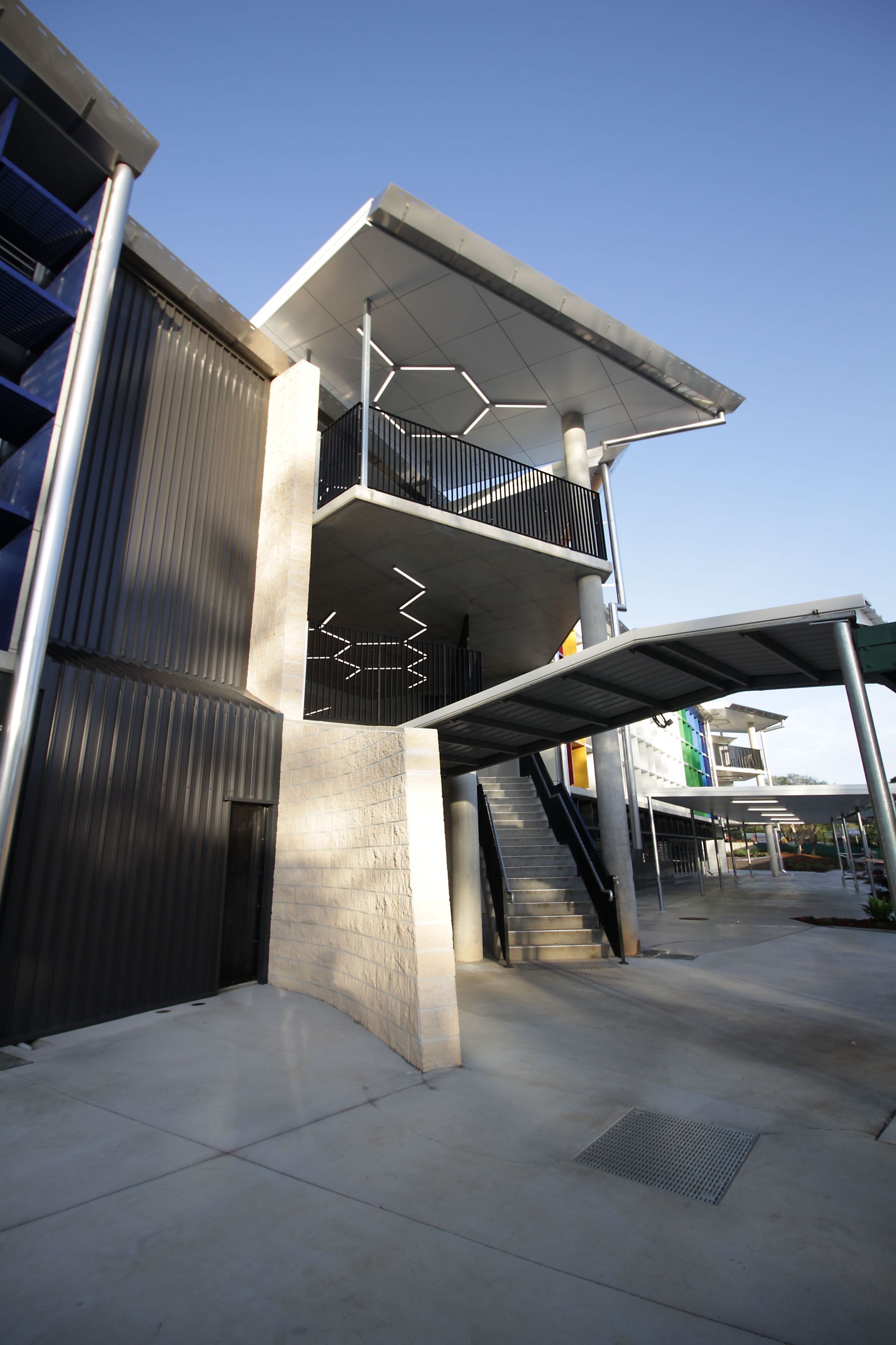A building with stairs leading up to the top of it