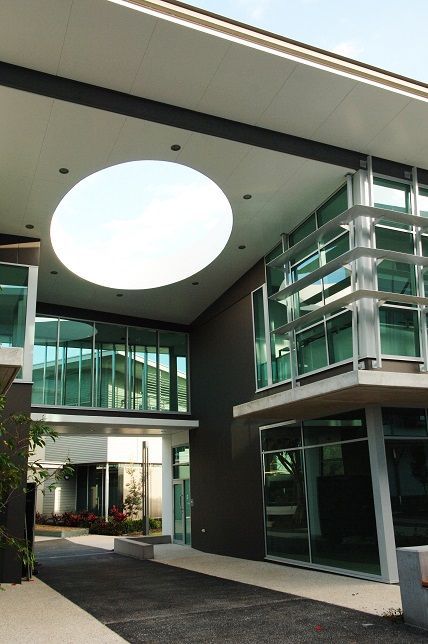 A building with a circle in the middle of it