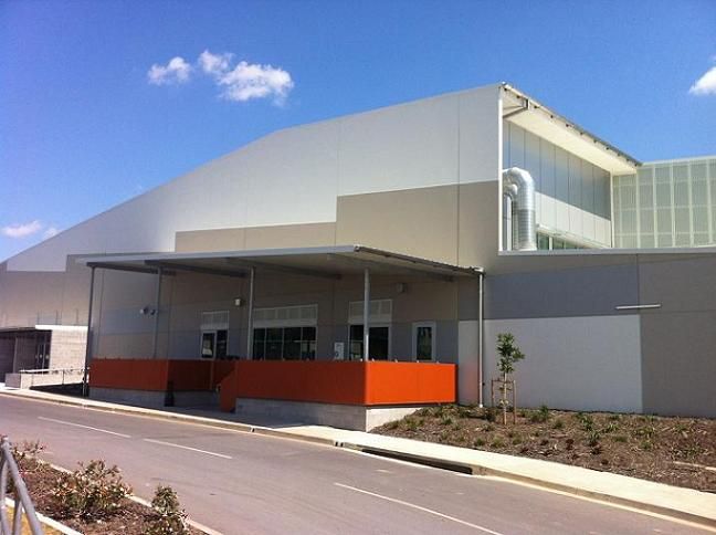 A large building with a canopy over the entrance
