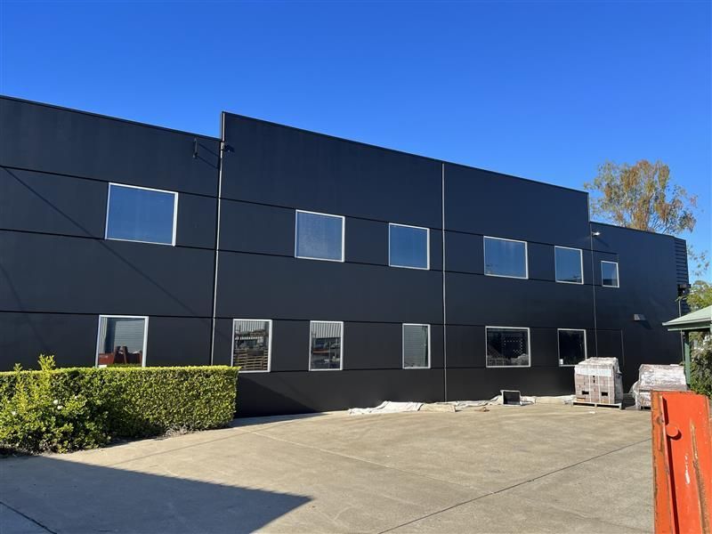 A large black building with a lot of windows