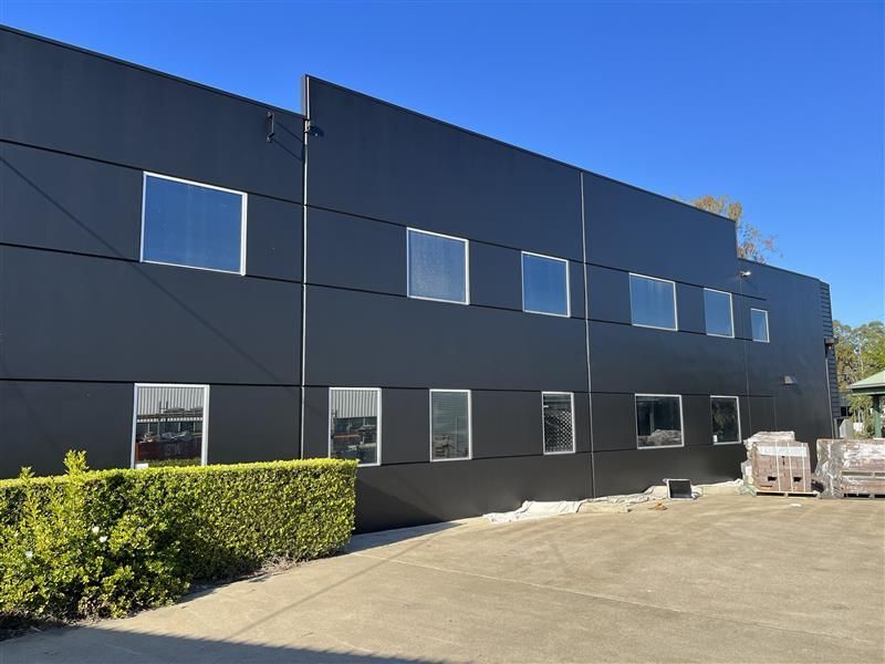 A large black building with a lot of windows