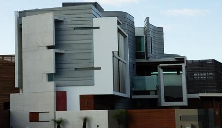 A large modern house with a lot of windows