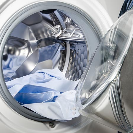 Washing machine loaded with clothes
