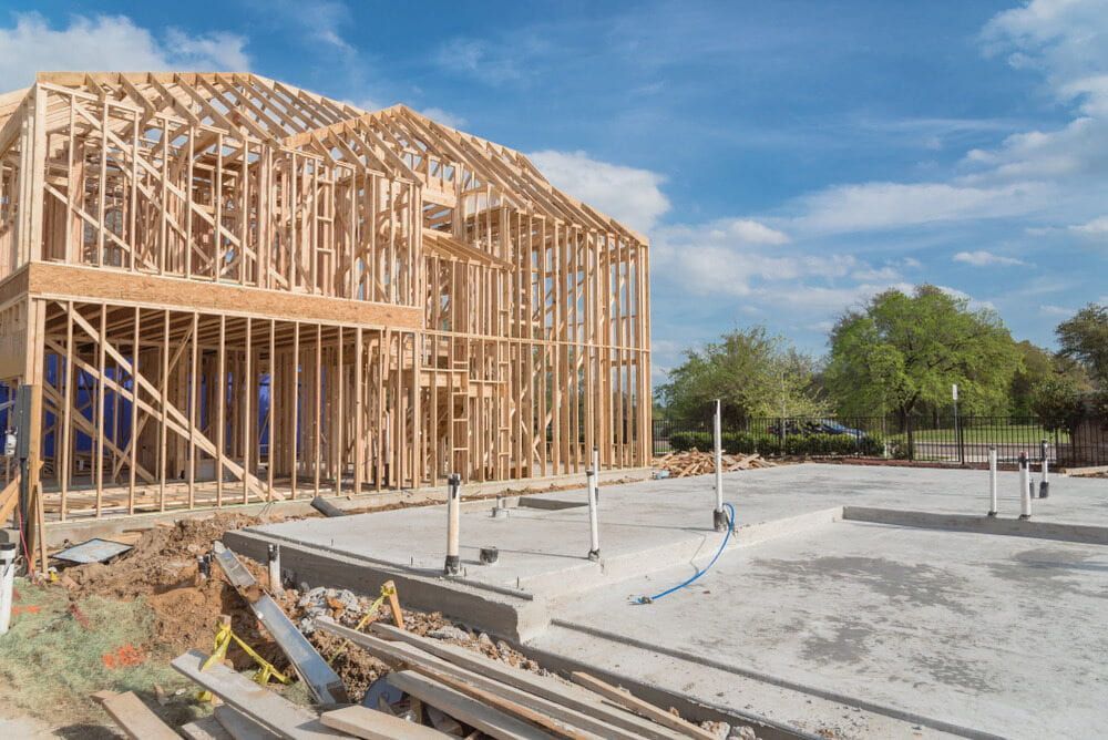 A House is Being Built on a Concrete Foundation — Ozi Construction Pty Ltd in Mosman, NSW