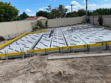 A Concrete Foundation is Being Built in a Backyard — Ozi Construction Pty Ltd in Griffith, ACT