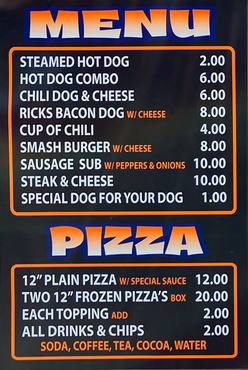 Menu board with food items: hot dogs, burgers, pizza, and drinks.