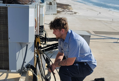 Certified HVAC technician performing emergency AC repair in Fort Morgan Alabama
