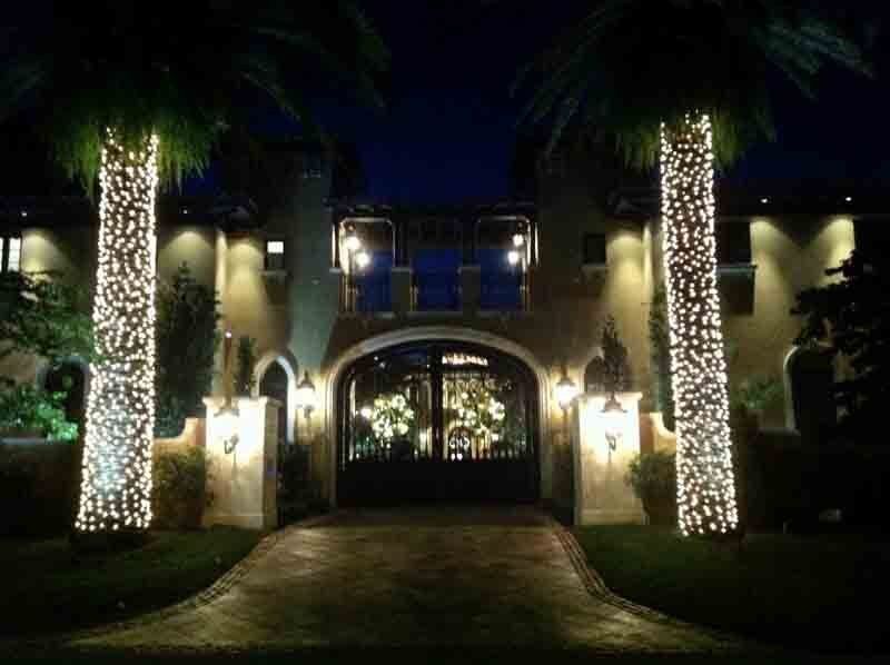 Elegant Christmas outdoor lighting display in Miami mansion
