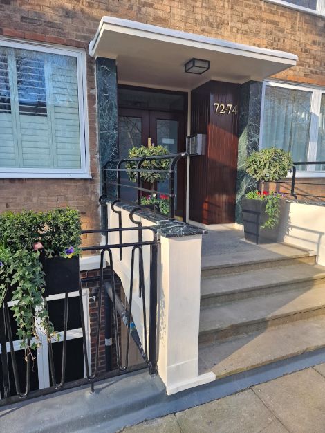 A wonderful marble column and handrail installation completed in London by Master Tiling