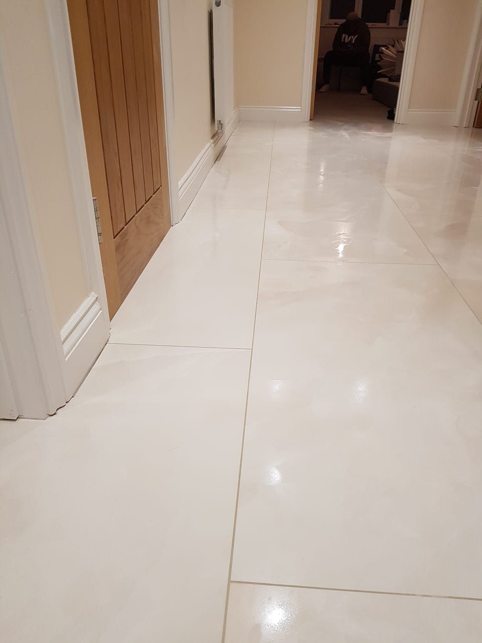 A lovely, clean and freshly completed floor in a London home, tiled with onyx-effect marble by Master tiling