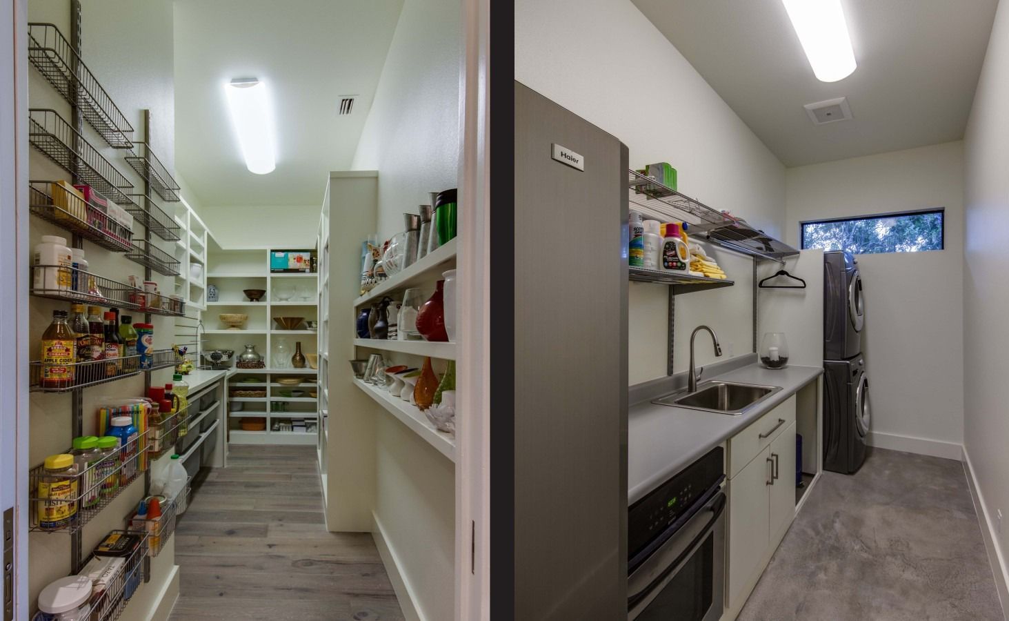 Pantry and laundry room with shelves, appliances, and sink. White walls, grey flooring, and food items.