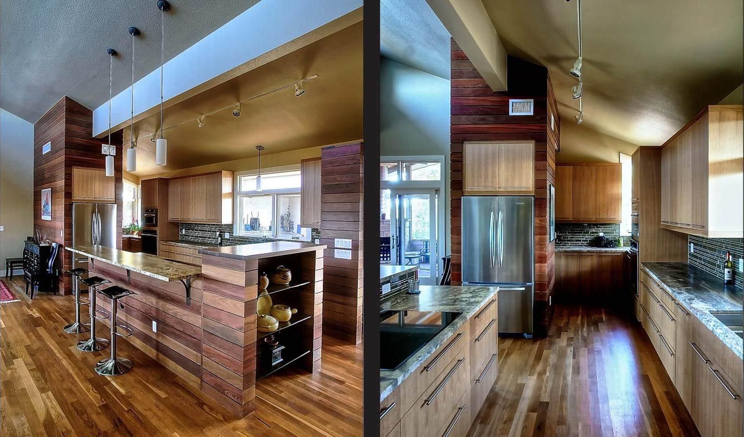 Modern kitchen with wood floors and cabinets, granite countertops, and a large island.