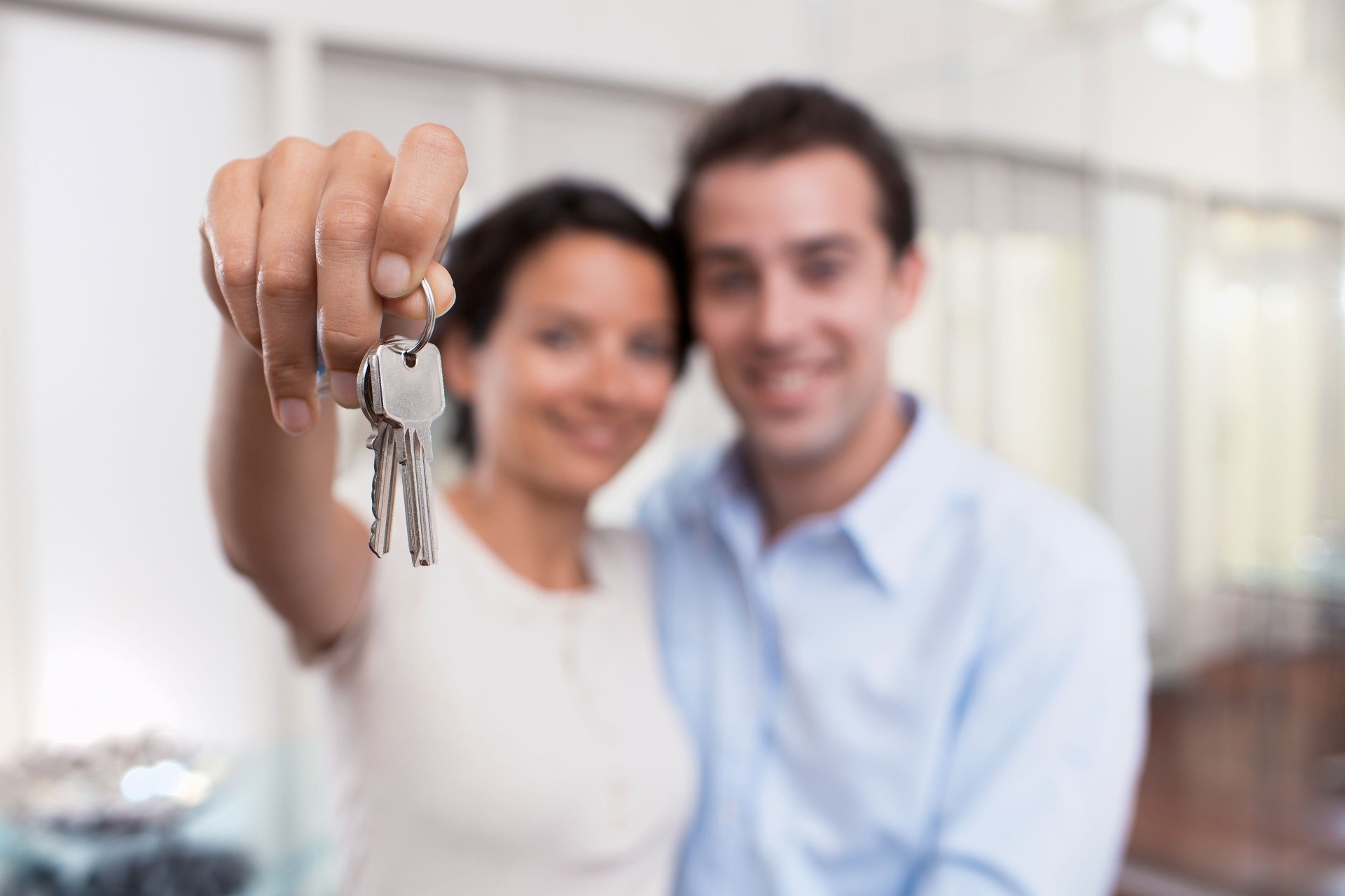 Young couple with house keys