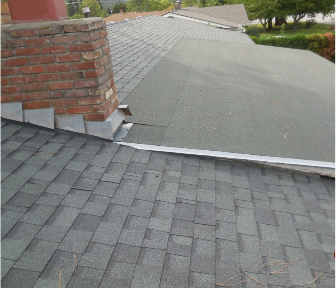 A roof with a chimney on top of it