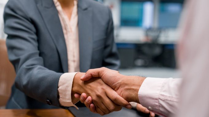 Two People Shaking Hands — Goshen, NY —  John E. Bach Jr. Attorney at Law