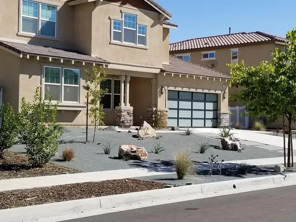 A house with a garage and a lot of windows