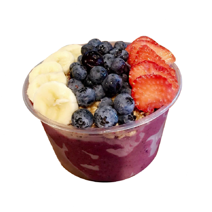 A smoothie bowl with blueberries bananas and strawberries from farm fresh