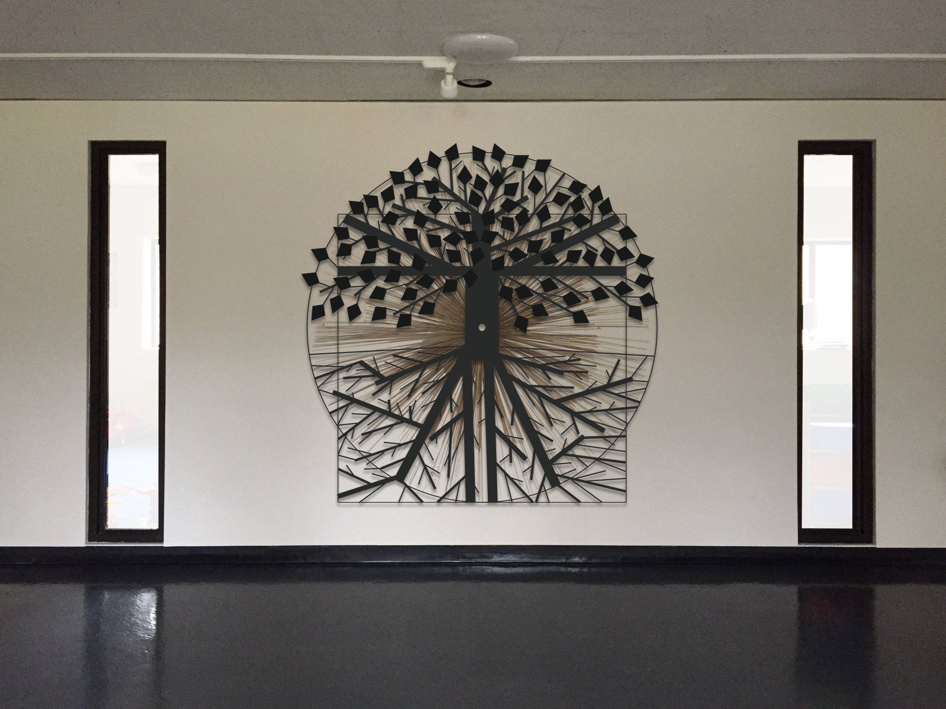 A wall with a drawing of a tree on it