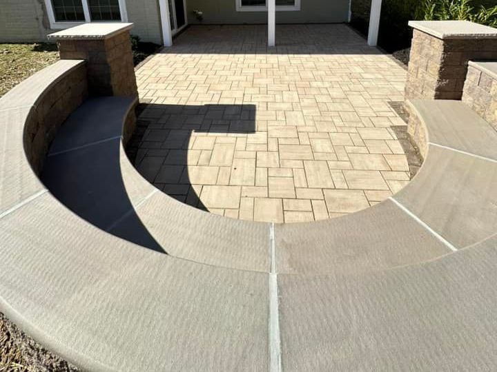 Wrap around Stone Sitting Wall in the backyard of a Bel Air, Maryland Homeowner