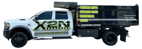 A dump truck with the word x2n on the side of it.