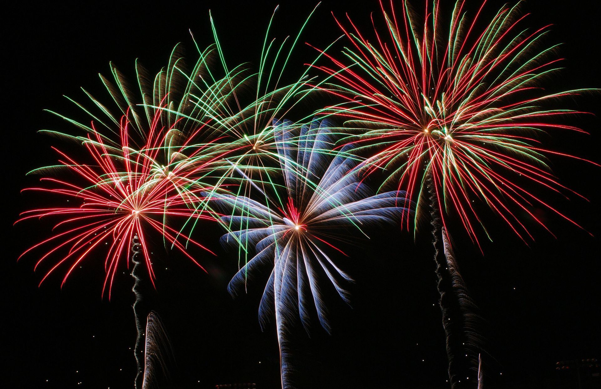 Fourth of July fireworks illuminating the night sky at the Rockville Independence Day Celebration in Maryland.