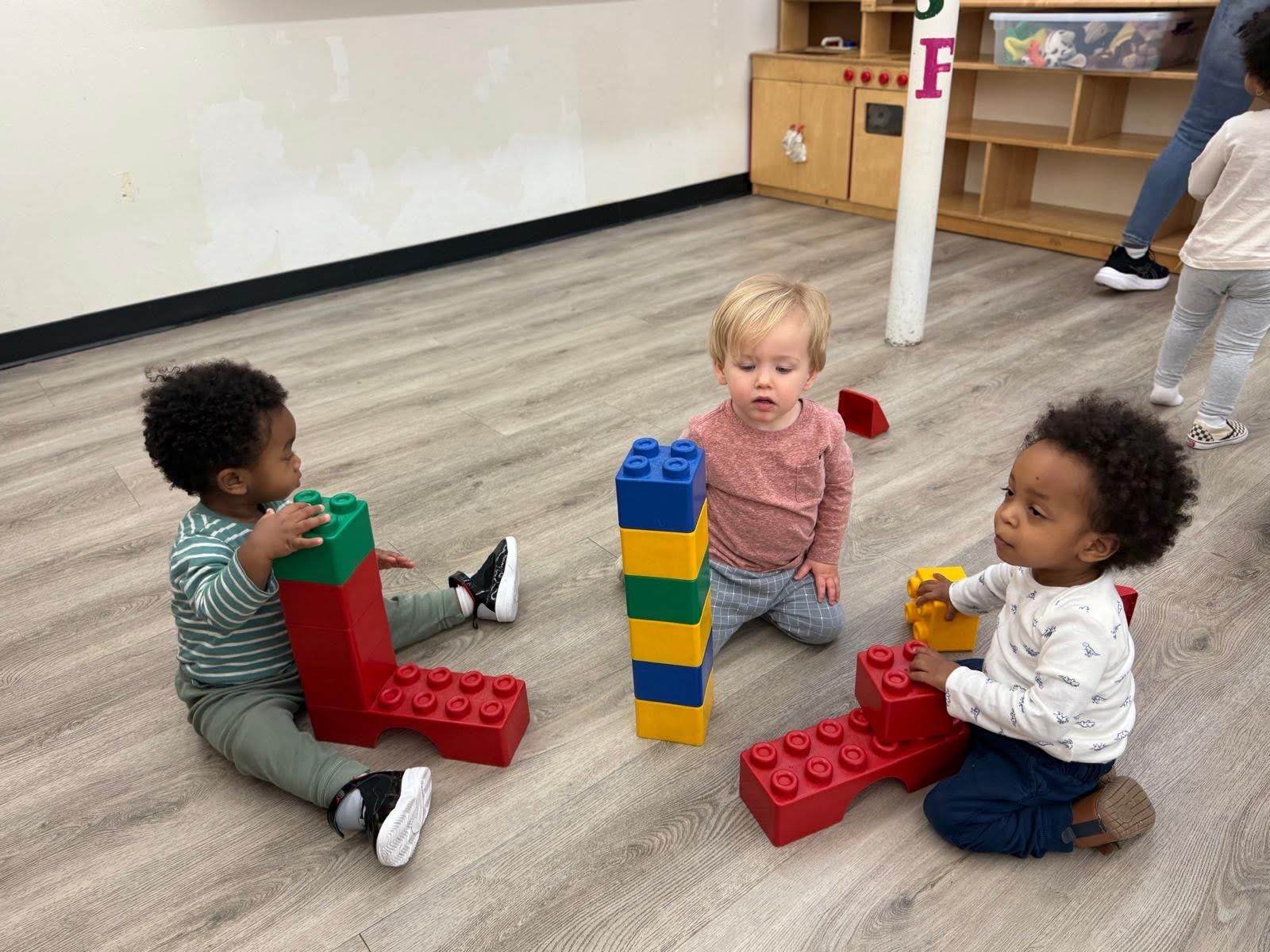 Infants playing indoors