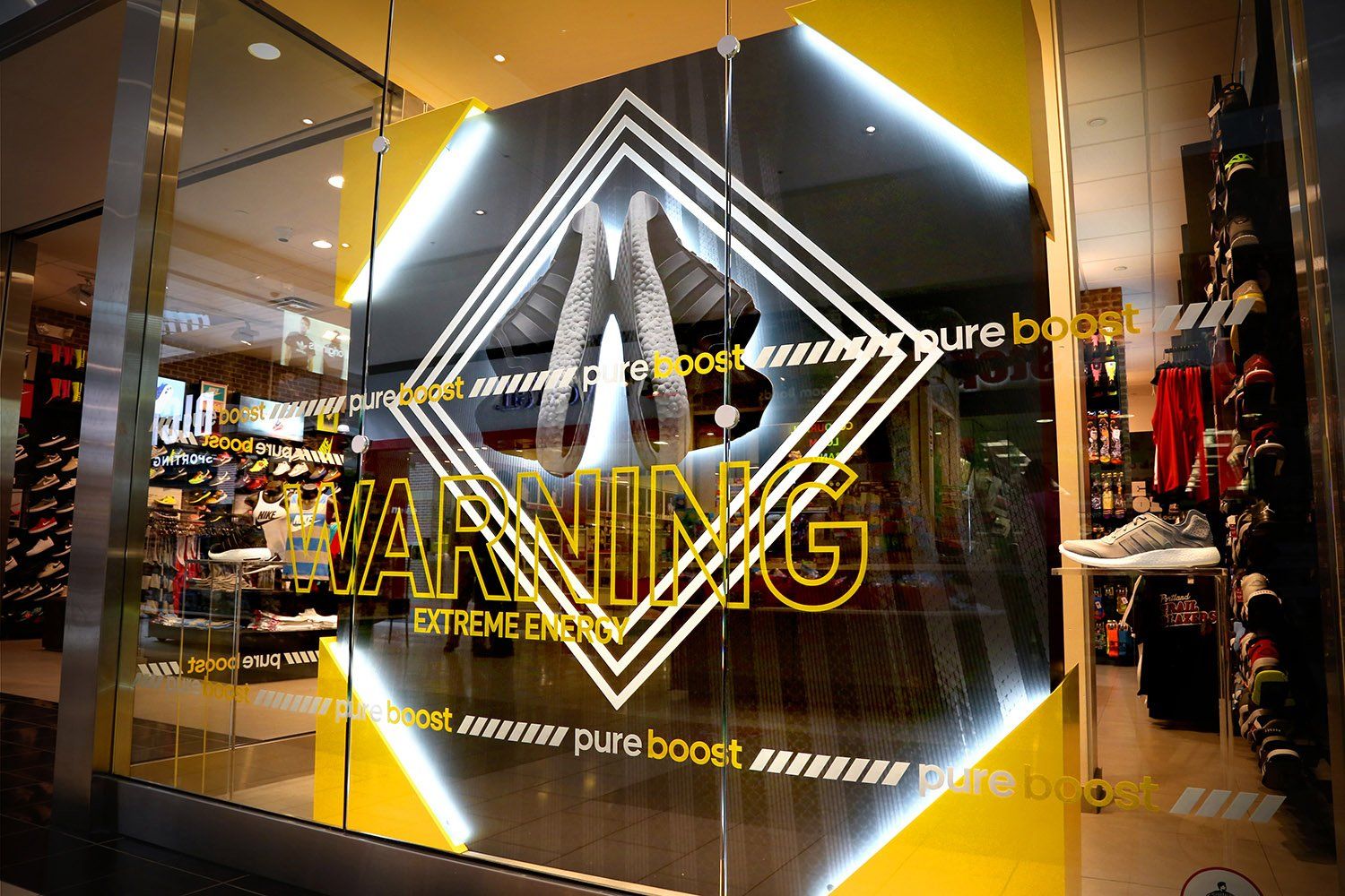 A store window with the word warning on it